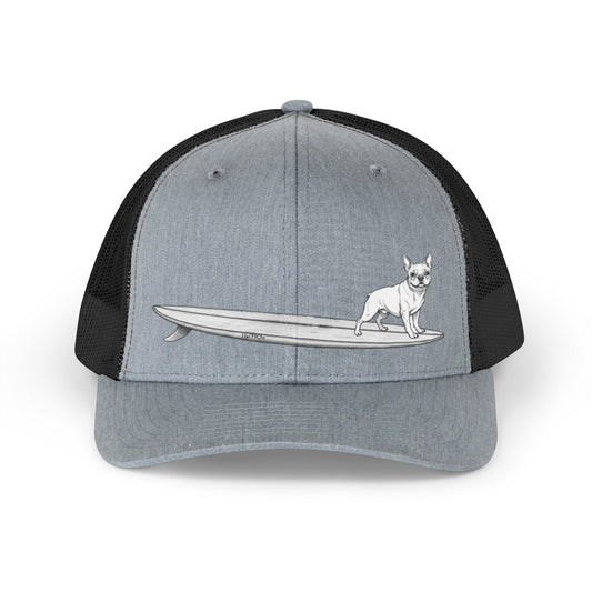 Gray and black with a black line drawing of a French Bulldog on a long surfboard with a gray background.