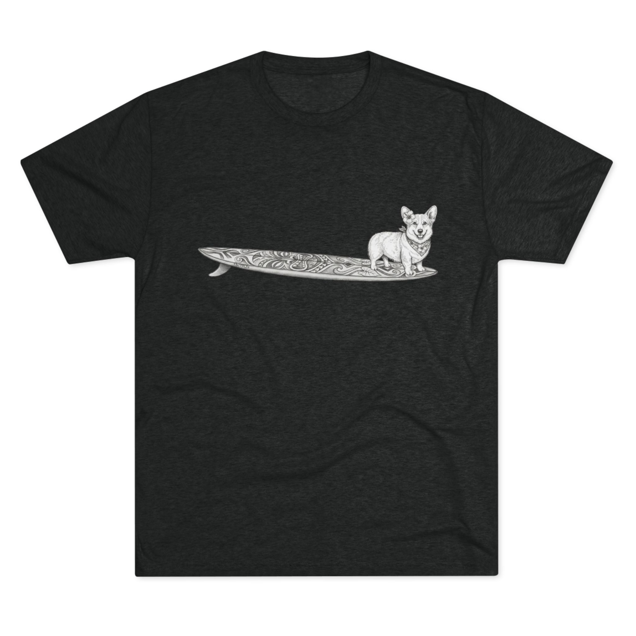 Black tshirt with a Corgi on a tiki art longboard with a hibiscus in it's ear and a hibiscus bandana around it's neck on a black background.