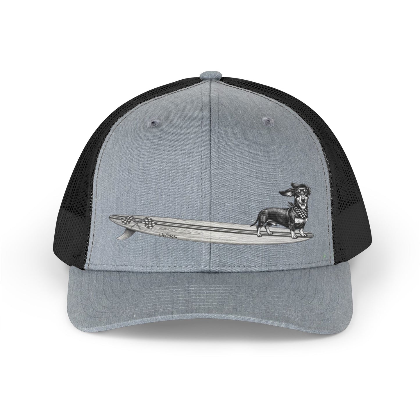 Gray and black mesh trucker hat with a Dachshund dog on a longboard surfboard with racing flags on it. The dog has a checkered bandana around it's neck. 