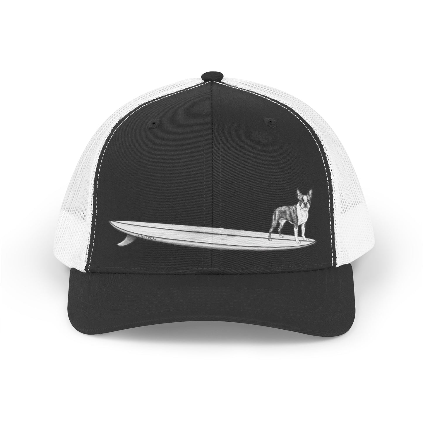 Black and white trucker hat with a black and white graphic of a Boston Terrier on a surfboard design on a black background. 
