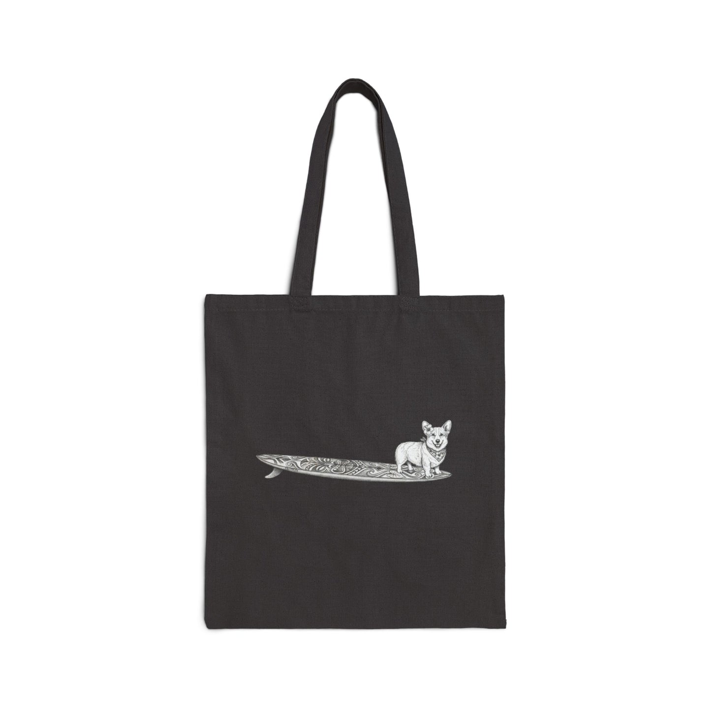 Black tote bag with a Corgi dog with a hibiscus in her ear and a hibiscus bandana and a tiki style surfboard design on a black background