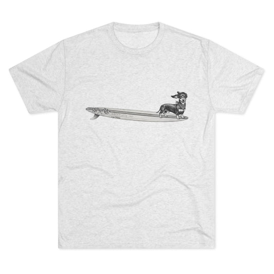 White tshirt with a Dachshund dog on a longboard surfboard with racing flags on it. The dog has a checkered bandana around it's neck. 