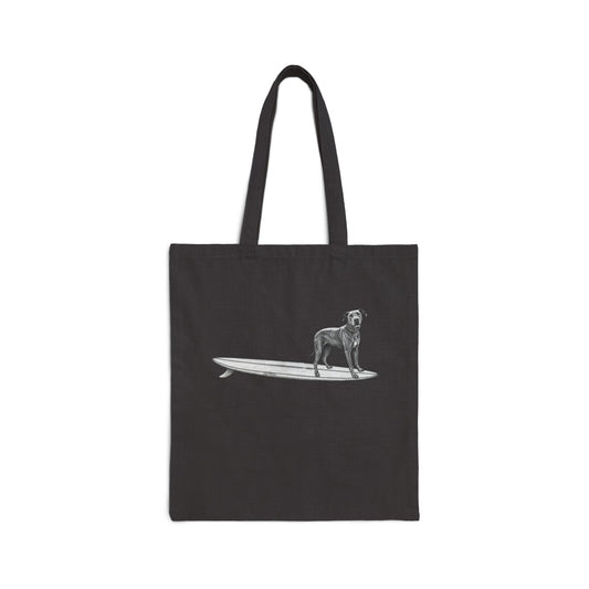 Black tote bag with a Great Dane on a surfboard design on a black background