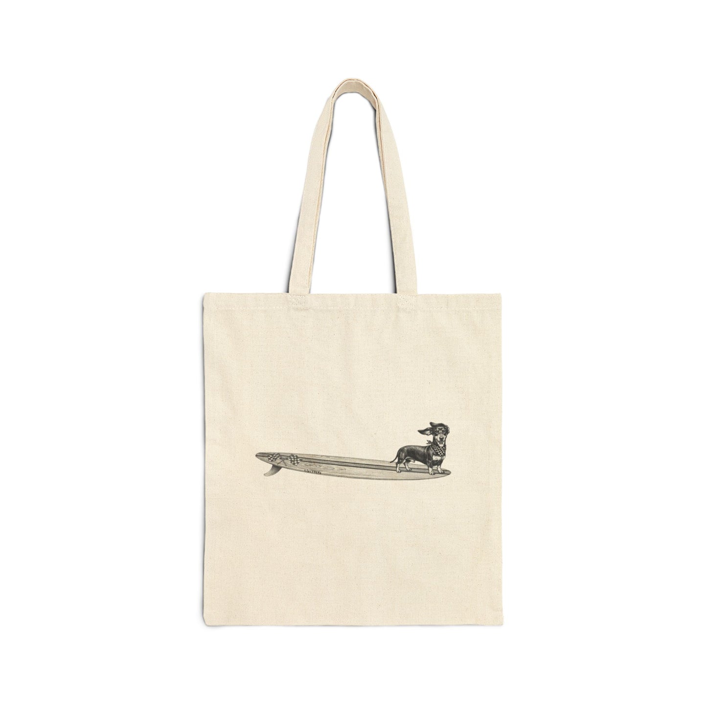 Beige canvas tote with a Dachshund dog on a long surfboard with racing flags on it. The dog has a checkered bandana around it's neck.