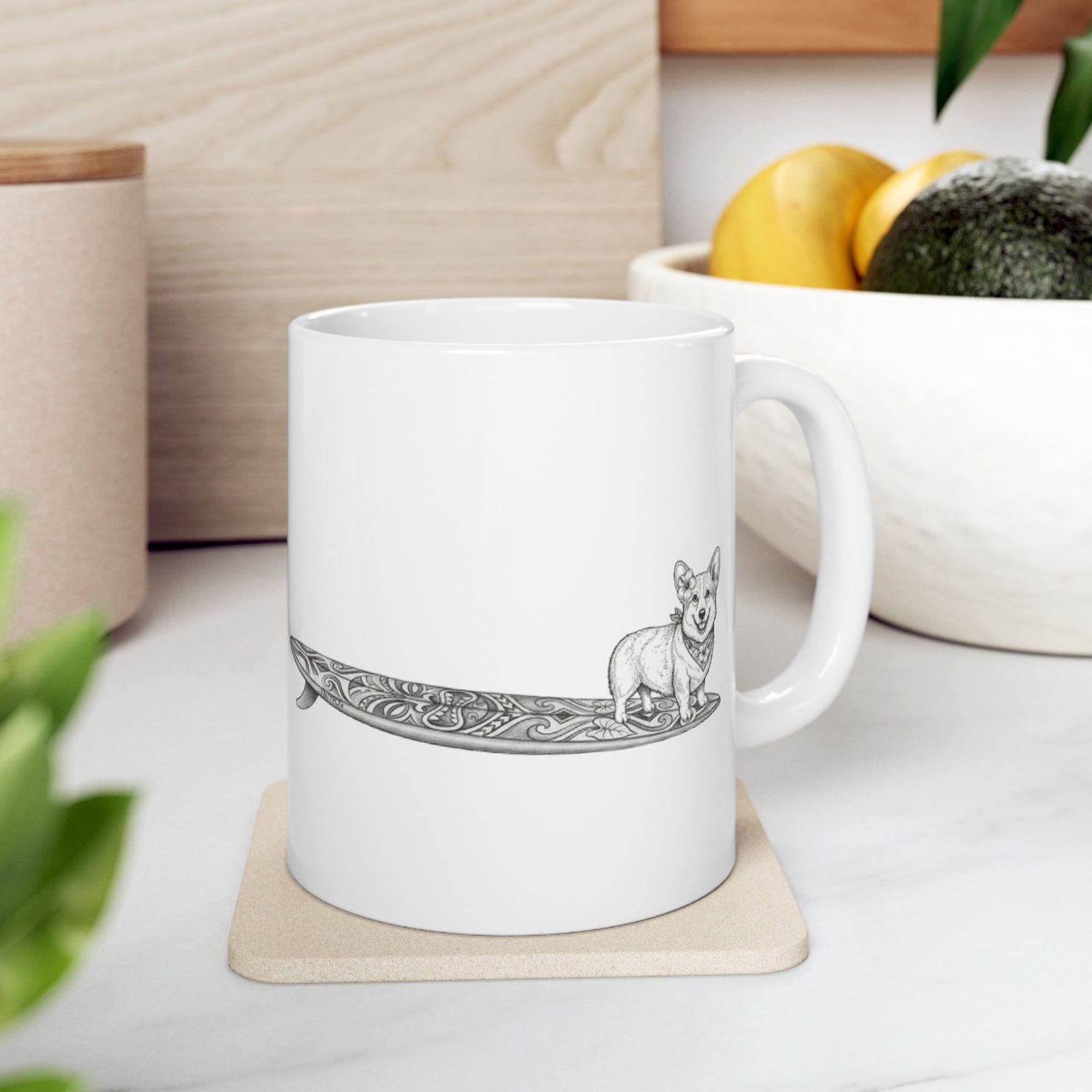 White mug with a design of a corgi with a hibiscus in her ear and a hibiscus bandana around her neck on a tiki art longboard surfboard with a white background.
