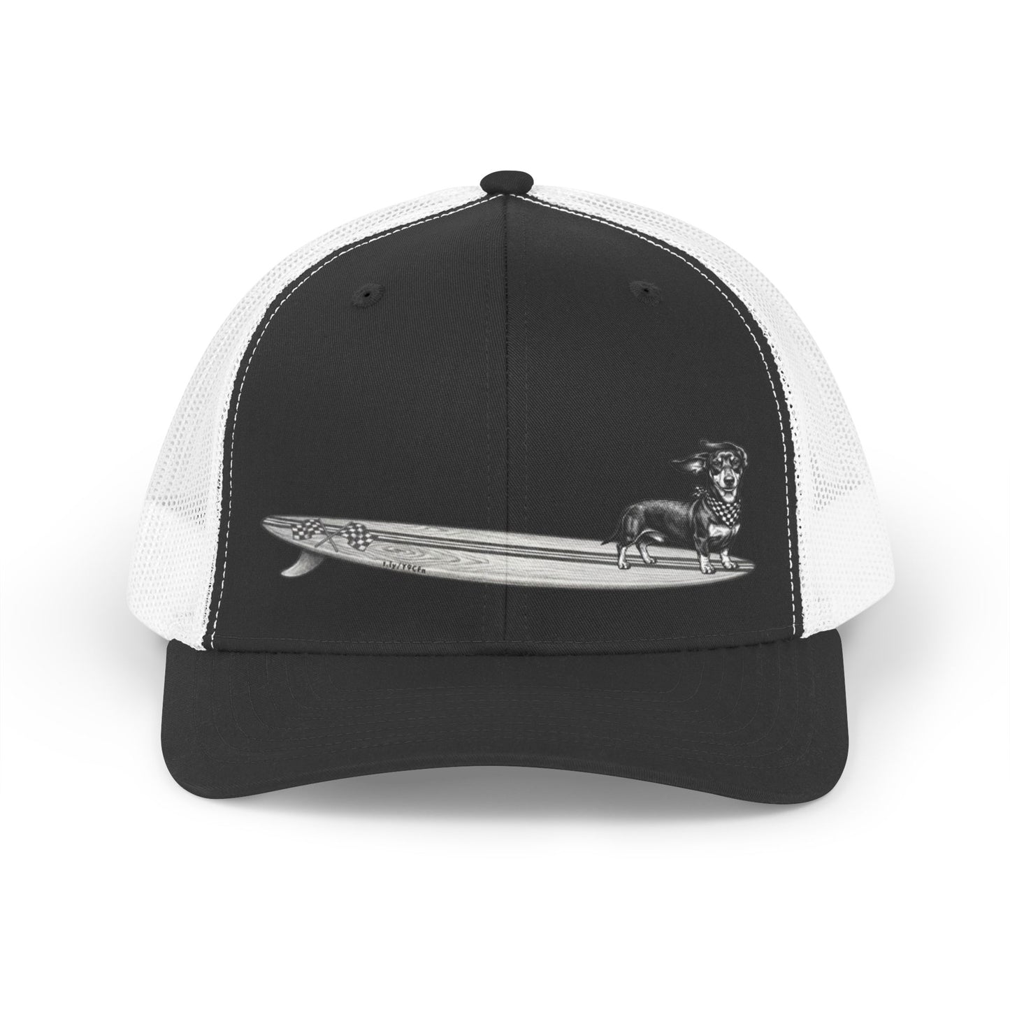 Black and white mesh trucker hat with a Dachshund dog on a longboard surfboard with racing flags on it. The dog has a checkered bandana around it's neck. 