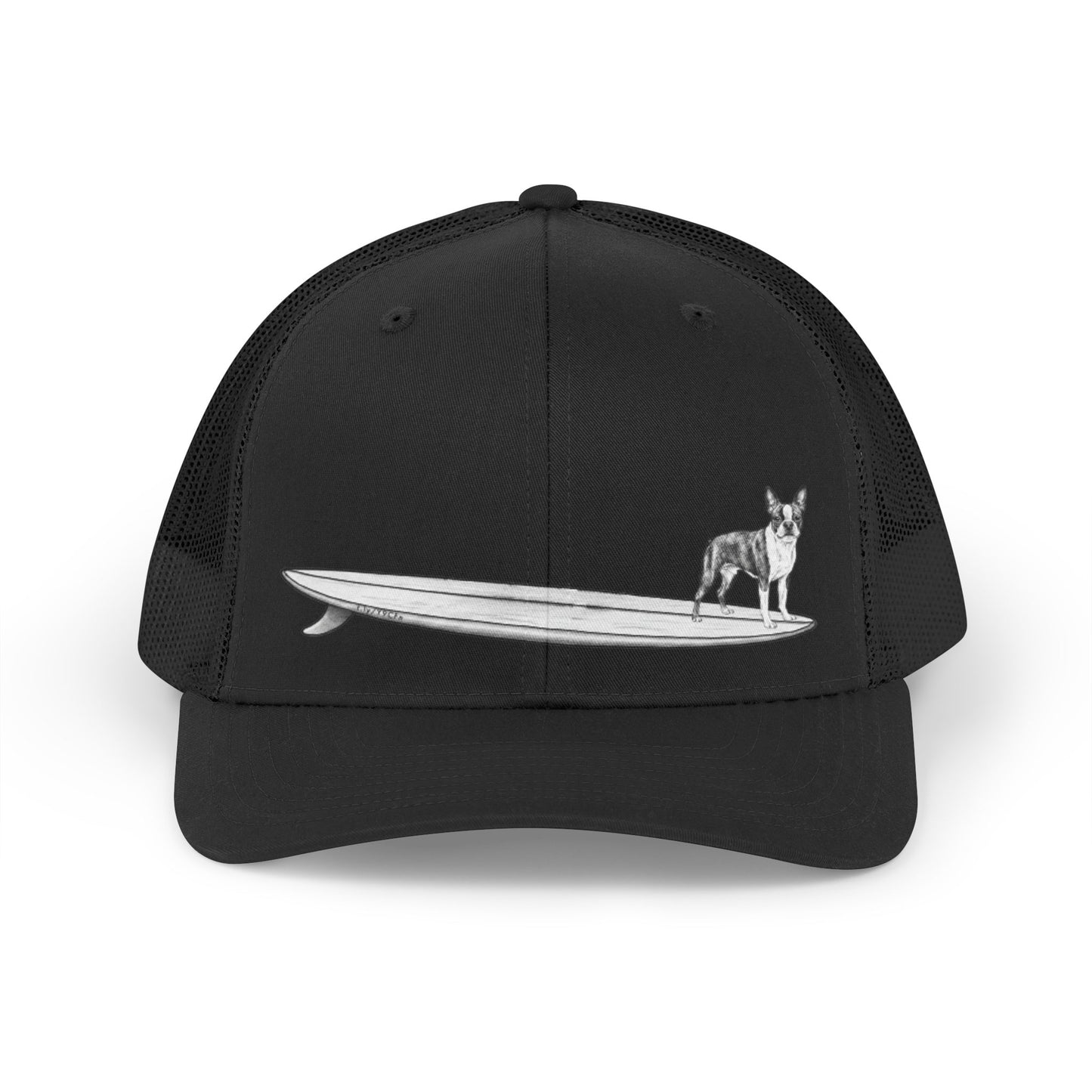 Black trucker hat with a black and white graphic of a Boston Terrier on a surfboard design on a black background. 