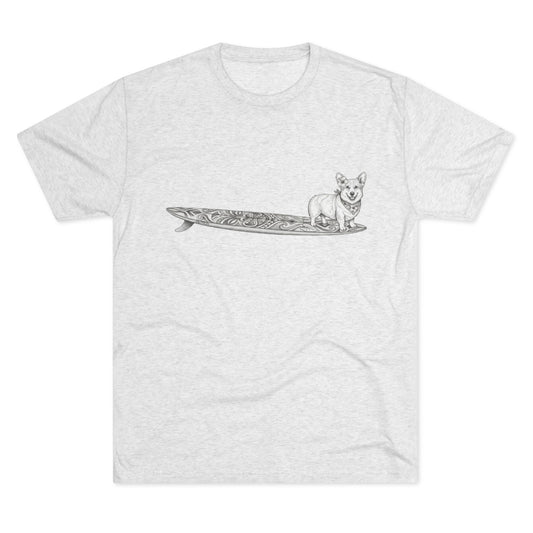 White tshirt with a Corgi on a tiki art longboard with a hibiscus in it's ear and a hibiscus bandana around it's neck on a white background.