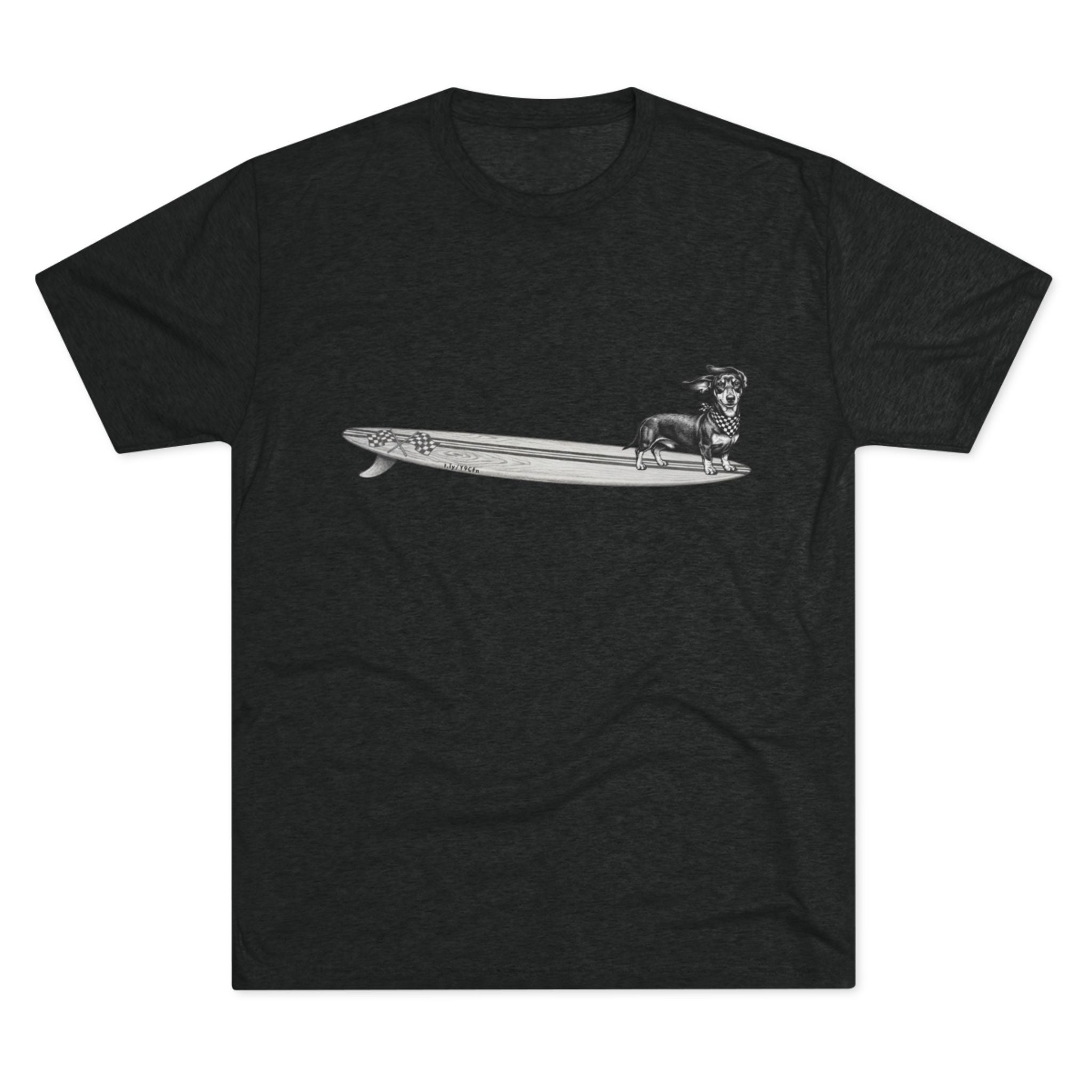 Black tshirt with a Dachshund dog on a longboard surfboard with racing flags on it. The dog has a checkered bandana around it's neck. 