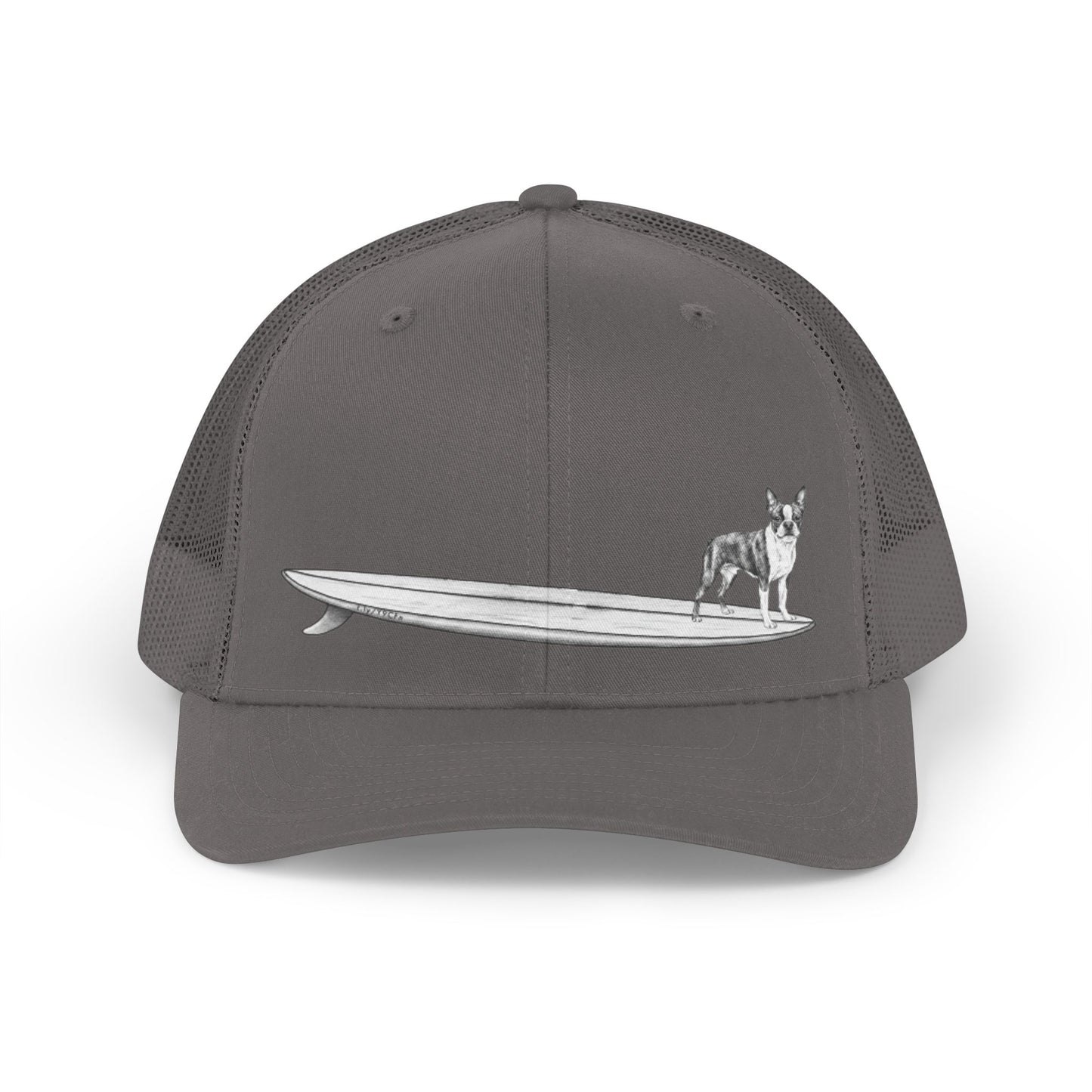 Gray trucker hat with a black and white graphic of a Boston Terrier on a surfboard design on a gray background. 