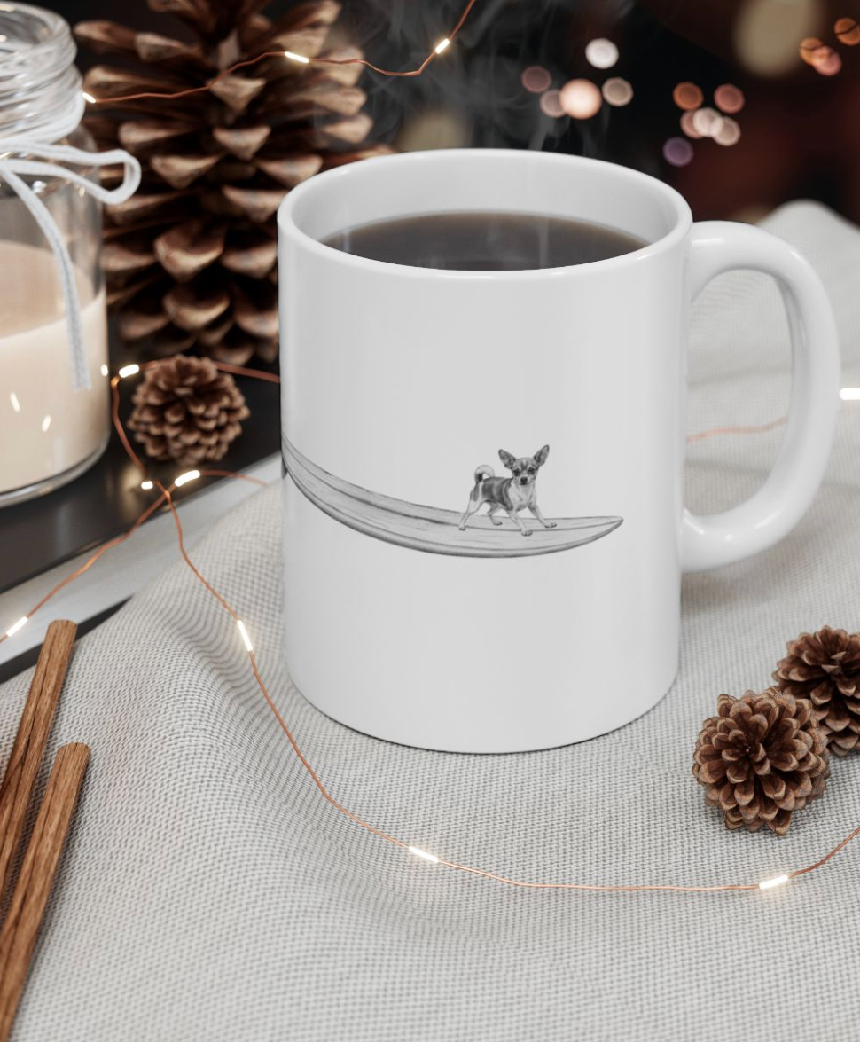 White mug with a design of a chihuahua on a longboard on a white background.